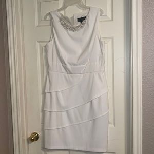 White dress with pearl collar